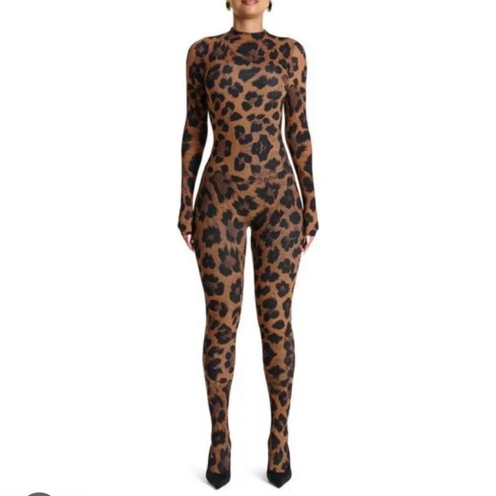 42. Naked Wardrobe $118 animal print closed toe jumpsuit - Picture 1 of 3